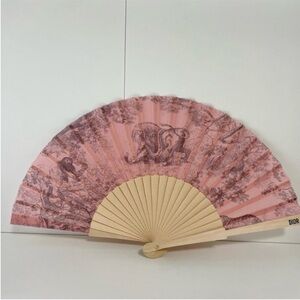 Dior gift holding fan
